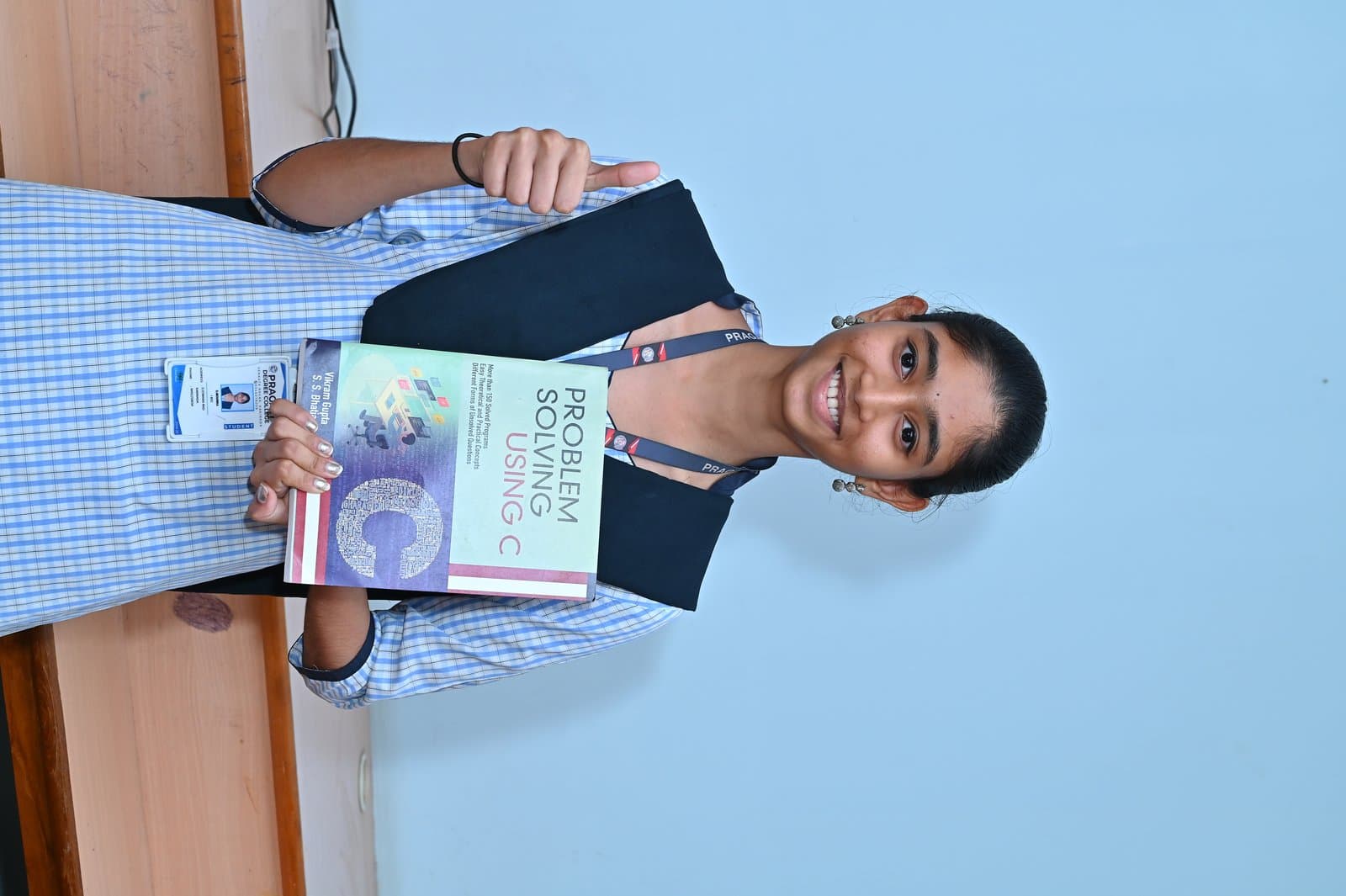 Computer Lab - Student with programming textbook